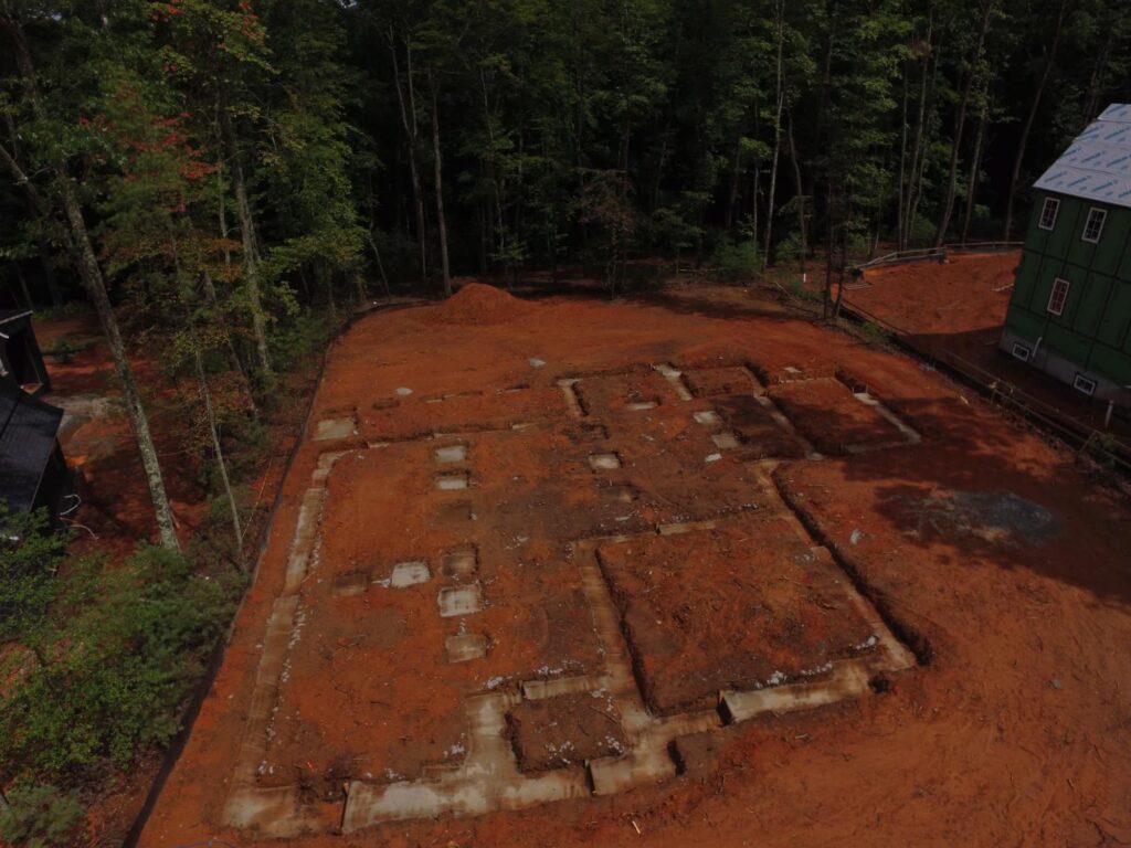 Home site graded and prepped in red clay